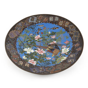 <b>A LARGE CLOISONNÉ ENAMEL DISH, DECORATED WITH A PAIR PHEASANTS AND SPARROW IN FLIGHT AMONGST FLOWERING CHRYSANTHEMUMS, WISTERIA AND BAMBOO</b>