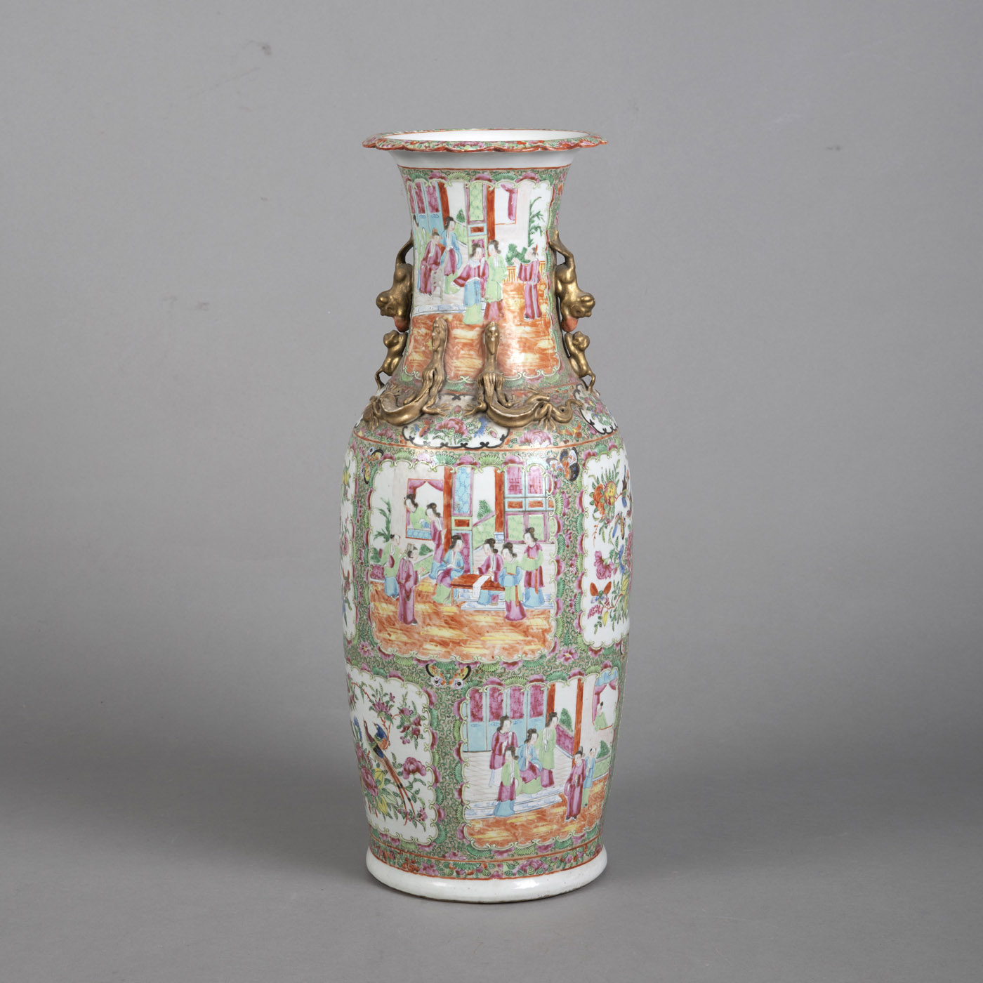 <b>A 'FAMILLE ROSE' FIGURAL PORCELAIN VASE WITH 'CHILONG' AND FLORIFORM LIP</b>