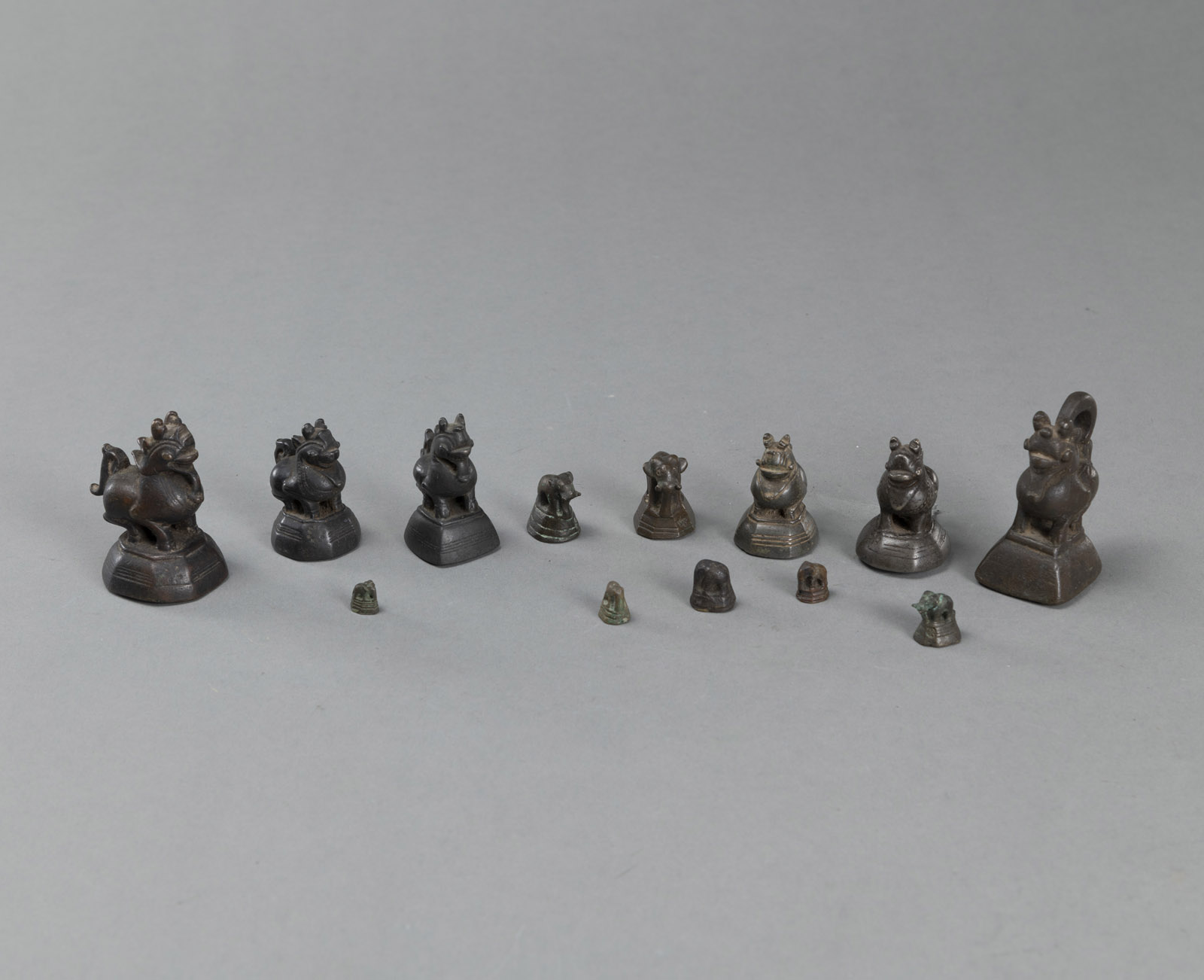 <b>THIRTEEN VARIOUS ANIMALS OPIUM WEIGHTS</b>