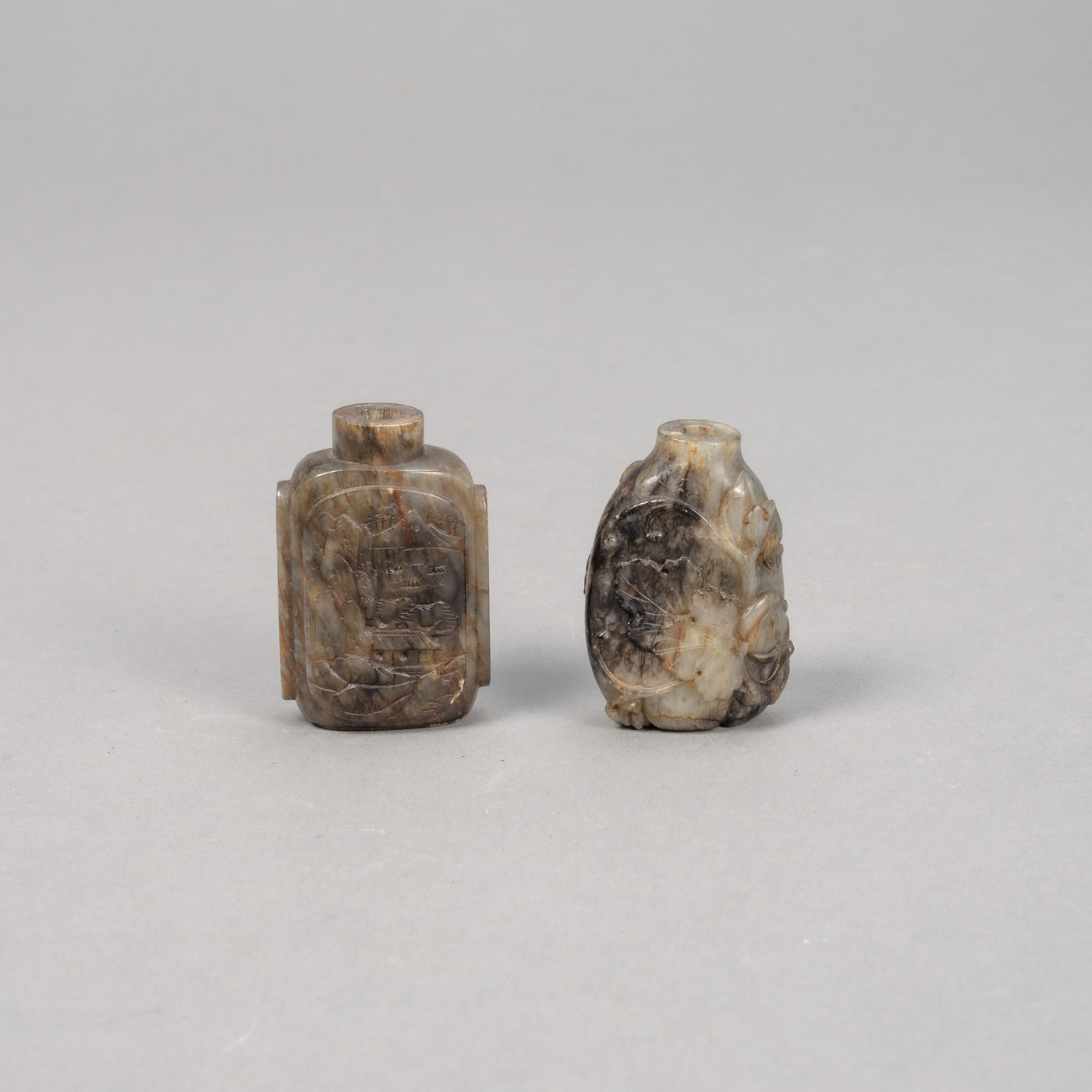 <b>TWO RELIEF CARVED LANDSCAPE AND FLORAL AGATE SNUFFBOTTLES</b>