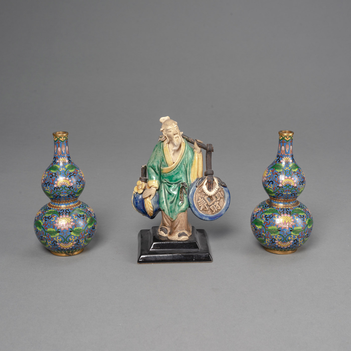 <b>A PAIR OF CLOISONNÉ-ENAMEL DOUBLE-GOURD VASES AND A POLYCHROME BISCUIT PORCELAIN FIGURE</b>