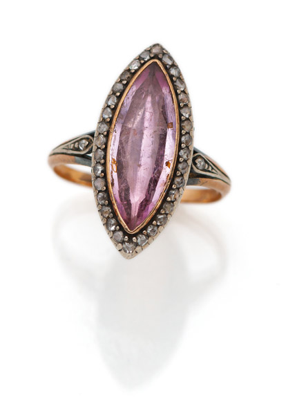 <b>A RING WITH ROSE TOPAZ</b>