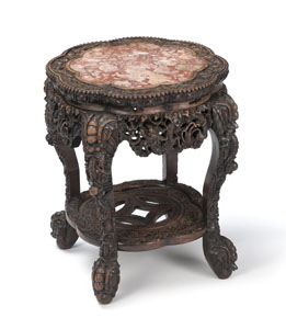 <b>AN EIGHT-LOBED STONE-INSET VASE STAND</b>