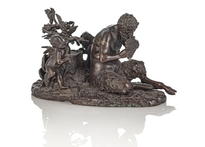 <b>A BRONZE GROUP WITH FLUTE-PLAYING FAUN AND TWO PUTTI</b>