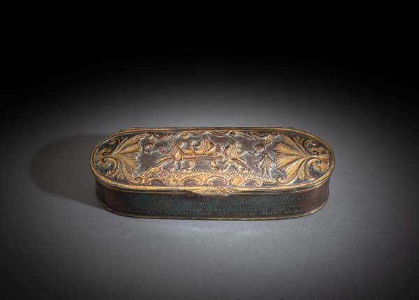 <b>A PARTIAL GILT ENGRAVED AND RELIEF PATTERN COPPER SNUFF BOX</b>