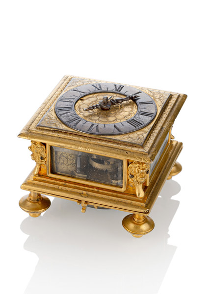 <b>A SMALL BAROQUE GILTBRASS SQUARE HORIZONTAL VERGE CLOCK</b>