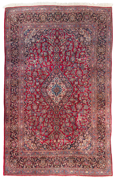 <b>A semi-antique Kashan carpet with central medallion</b>