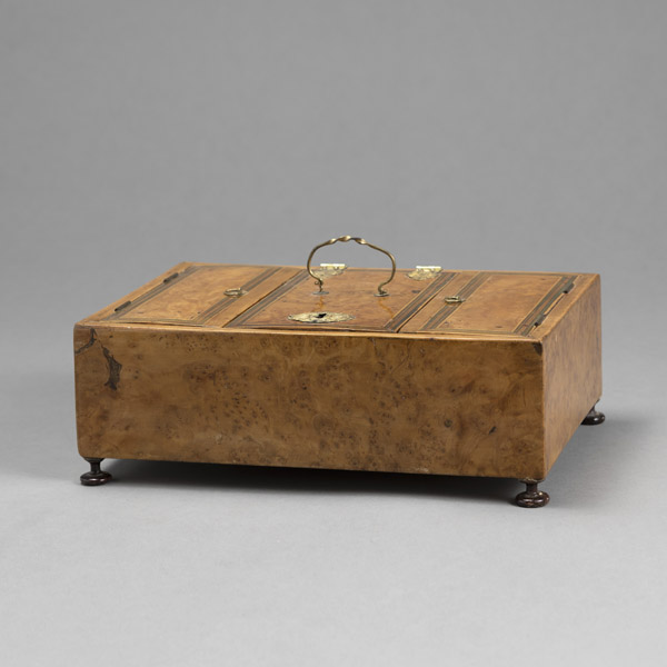 <b>A FINE METAL MOUNTED ROOTWOOD CASKET</b>