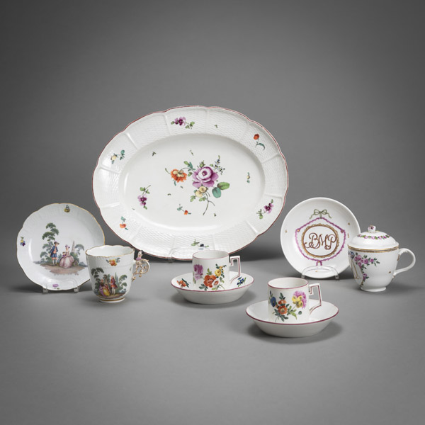 <b>FOUR PORCELAIN CUPS AND AN OVAL DISH</b>