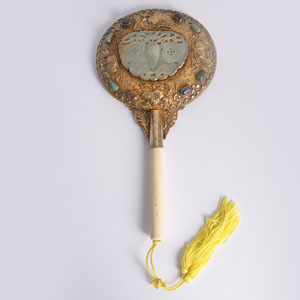 <b>A JADE BUTTERFLY-INLAID SILVER-MOUNTED IVORY-HANDLED MIRROR</b>