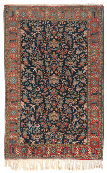<b>An all over floral patterned semi antique Tabriz rug</b>