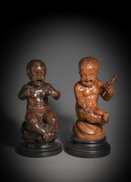 <b>TWO PUTTI WITH CHARACTER HEADS</b>