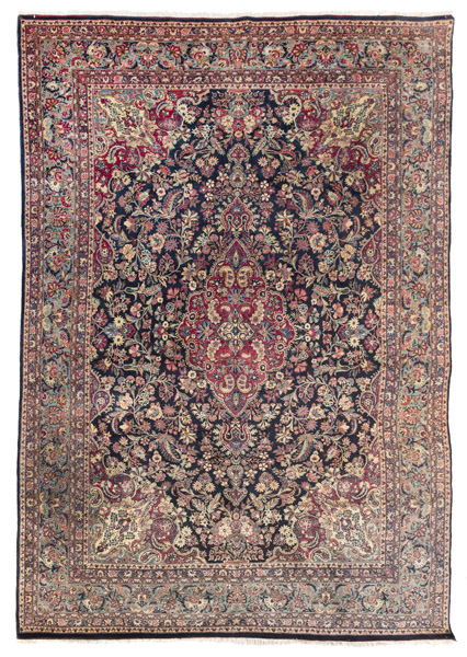 <b>A semi antique Sarouk carpet with rich floral ornamentation</b> <b>A semi antique Sarouk carpet with rich floral ornamentation</b>