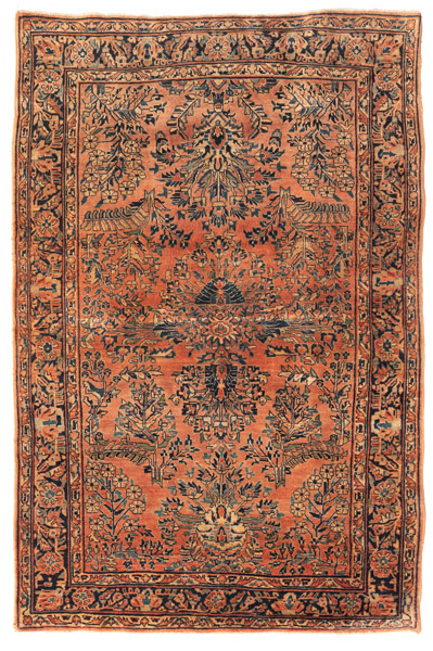 <b>A reimport Sarouk rug in soft colors with large floral ornaments</b>