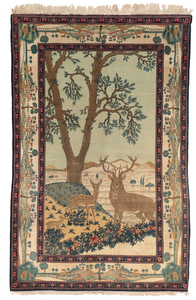 <b>A figural Teheran rug with landscape scenes and two deers</b>