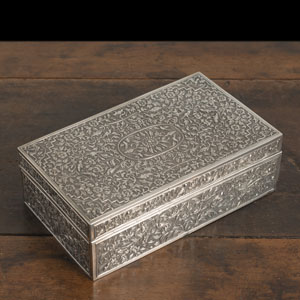 <b>A RECTANGULAR HINGED FLORAL RELIEF SILVER BOX</b>