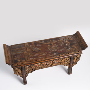 <b>A MINIATURE WOOD ALTAR TABLE  WITH FIGURAL LACQUERED DECORATION AND APRON WITH SQUIRREL AMIDST LEAVES CARVED IN OPENWORK</b>
