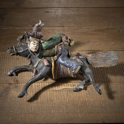<b>A POLYCHROME CERAMIC FIGURE OF A HORSE RIDER</b> <b>A POLYCHROME CERAMIC FIGURE OF A HORSE RIDER</b>