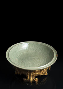 <b>A FINE AND RARE ORMOLU-MOUNTED CELADON CHARGER WITH LOTUS BLOSSOM</b>