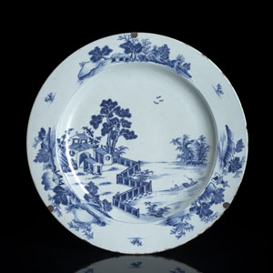<b>A BLUE AND WHITE 'FISHERS IN A RIVER LANDSCAPE' PORCELAIN CHARGER</b>