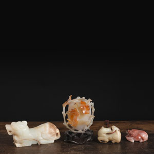 <b>A FLORAL RELIEF AGATE VASE AND THREE CARVINGS OF JADE A. O.</b> <b>A FLORAL RELIEF AGATE VASE AND THREE CARVINGS OF JADE A. O.</b>