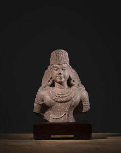 <b>A RED-MOTTLED SANDSTONE BUST OF A MALE DEITY INDIA</b>