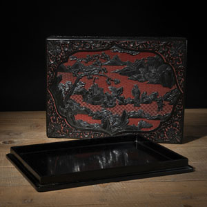 <b>A BLACK- AND RED-LACQUER 'SCHOLARS PLAYING WEIQI' BOX AND COVER</b> <b>A BLACK- AND RED-LACQUER 'SCHOLARS PLAYING WEIQI' BOX AND COVER</b>