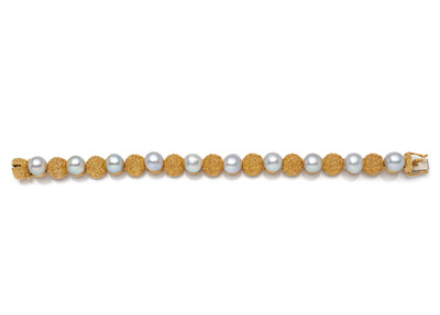 <b>A GOLD AND PEARL BRACELET</b>