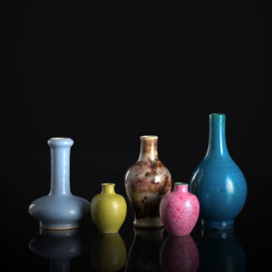 <b>A GROUP OF FIVE SMALL VASES, FOUR WITH MONOCHROME GLAZE, ONE WITH SPOTTED GLAZE</b>