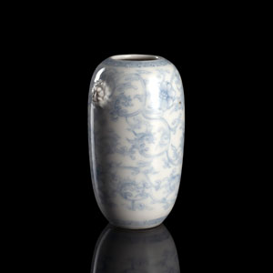 <b>A BLUE AND WHITE FLOWER VASE WITH TWO MASK HANDLES</b>