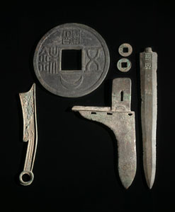 <b>A GROUPE OF COINS AND WEAPONS</b>