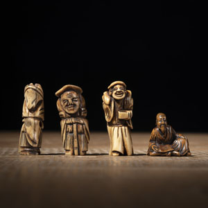 <b>THREE STAGHORN AND ONE WOOD NETSUKE</b>