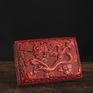 <b>A DRAGON RELIEF CINNABAR-LACQUER BOX</b>