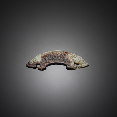 <b>A MINIATURE JADE CARVING 'HUANG' WITH TWO TIGER HEADS</b>