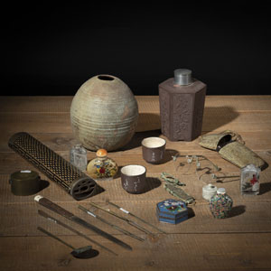 <b>A 'ZISHA' TEA CADDY, A CERAMIC VASE, A CLOISONNÉ-ENAMEL BOX AND COVER, GLASSES IN A CASE, AND SNUFFBOTTLES</b>