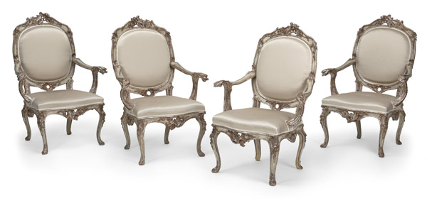 <b>A SET OF FOUR GERMAN SILVERED AND GILTWOOD FAUTEUILS</b>