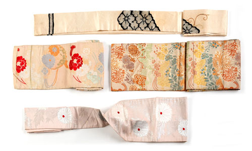 <b>A GROUP OF FOUR SILK OBI</b>