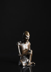 <b>A SILVER-WIRE INLAID BRONZE FIGURE OF THE EMACIATED BUDDHA</b>