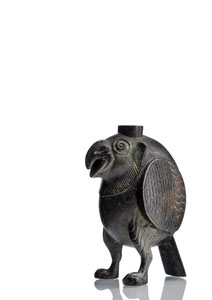 <b>A BRONZE CANDLE STAND IN THE SHAPE OF AN STANDING OWL</b>