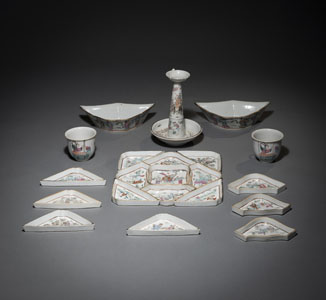 <b>A 'FAMILLE ROSE' NINE-PART PORCELAIN SWEETMEAT SET, A CANDLESTICK, AND ADDITIONAL DISHES</b>