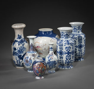 <b>SEVEN BLUE AND WHITE PORCELAIN VASES SHOWING FIGURES, A LANDSCAPE, AND TRIGRAMS</b>