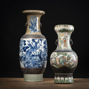 <b>TWO ANIMAL MASK-HANDLED FIGURAL RELIEF PORCELAIN VASES</b>