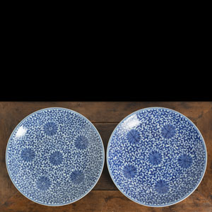<b>TWO BLUE AND WHITE LOTUS PORCELAIN CHARGERS</b>