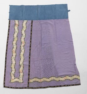 <b>A PAIR OF RED-GROUND SILK CHAIR COVERS AND A SKIRT</b> <b>A PAIR OF RED-GROUND SILK CHAIR COVERS AND A SKIRT</b>