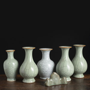 <b>FIVE CRAZED SELADON VASES AND A BRUSH REST</b>