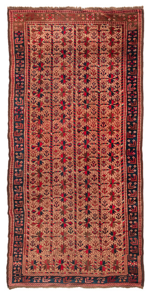 <b>A camel color Baluchi rug with geometrized tree ornaments</b>