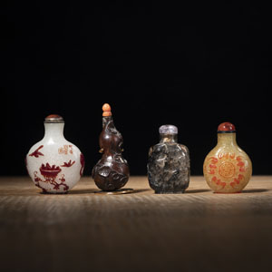 <b>A GROUP OF FOUR BEIJING GLASS AND WOOD SNUFFBOTTLES</b> <b>A GROUP OF FOUR BEIJING GLASS AND WOOD SNUFFBOTTLES</b>