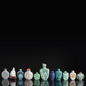 <b>A GROUPF OF ELEVEN JADE, JADEITE, LAPISLAZULI, AND MOTHER-OF-PEARL SNUFFBOTTLES</b>