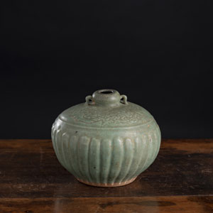 <b>A DRAGON RELIEF CELADON JUG</b>