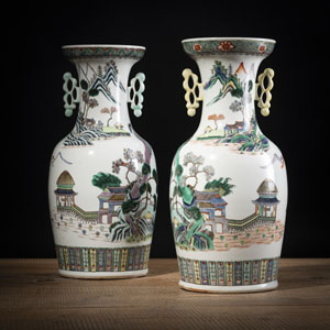 <b>A PAIR OF TWIN-HANDLED 'FAMILLE VERTE' LANDSCAPE PORCELAIN VASES</b>
